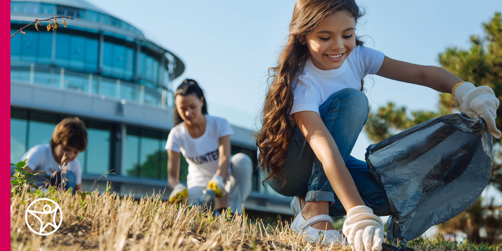 An image of two Connections Academy students helping to volunteer at a park and pickup trash.